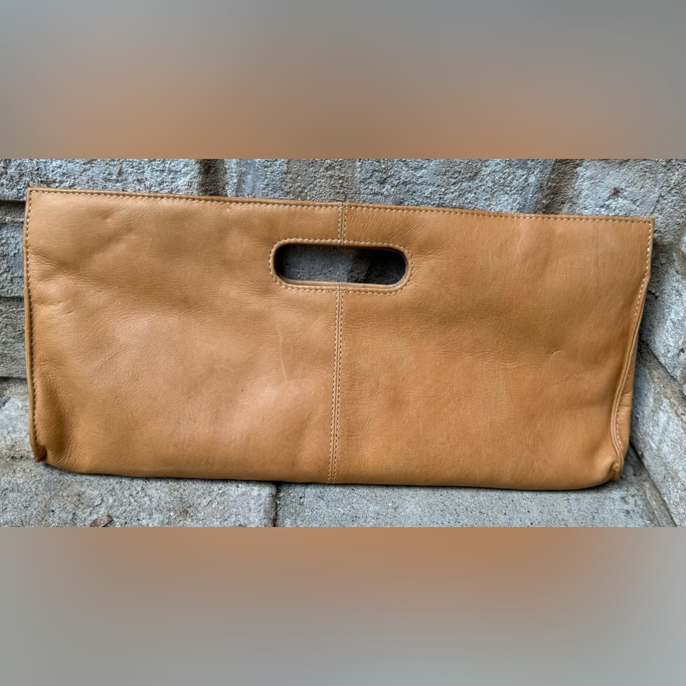 Chaos leather clutch handbag